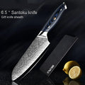 Blue G10 Damascus knife set with chef, Santoku, boning and peel knives on a light background