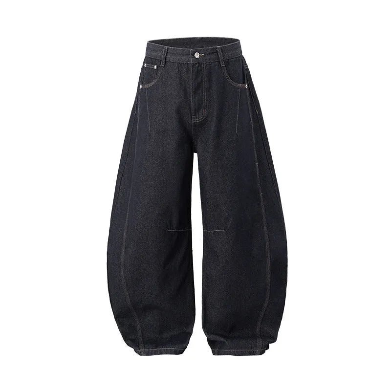 Men's original cow colour wide leg denim trousers laid flat, showing mid waist and straight leg cut.
