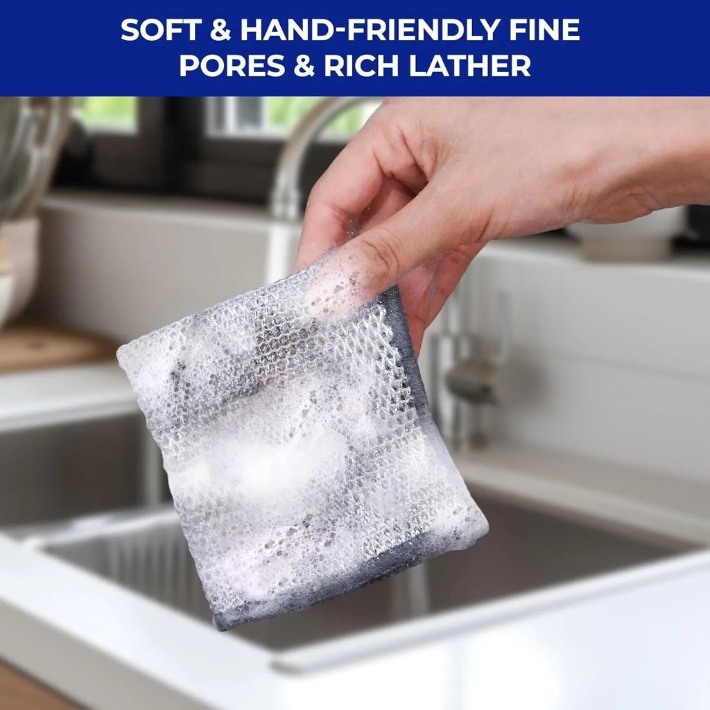 Silver wire and microfiber scouring pad cloth for cleaning pots and bowls on a kitchen counter.