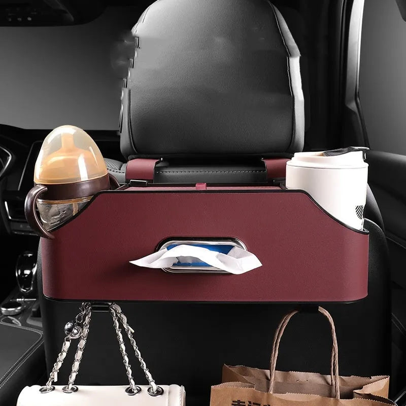 Genuine leather car tissue box and cup holder in beige colour, shown suspended.