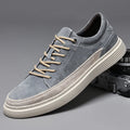 Men's grey casual skate shoes with pigskin upper and rubber sole lace-up design