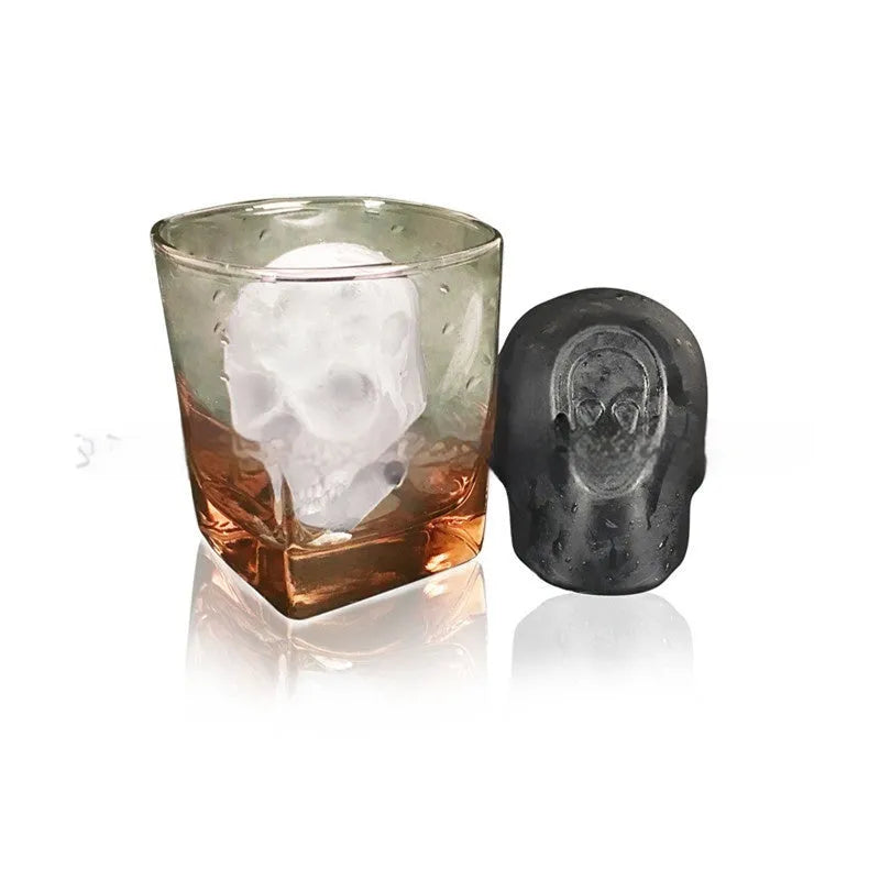 White silicone ice cube tray with detailed 3D skull mould cavities.