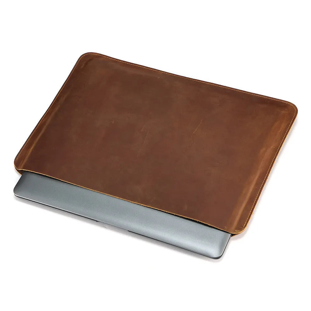 Brown genuine leather computer bag with horizontal liner design for organised storage
