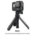 Mini telescopic selfie stick tripod expanded to full height with smartphone attached, ABS silicone, available in four colours