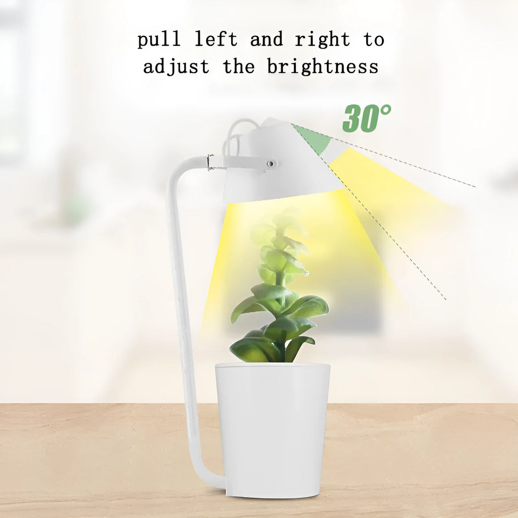 White plastic desktop hydroponic plant growth machine for soilless cultivation.
