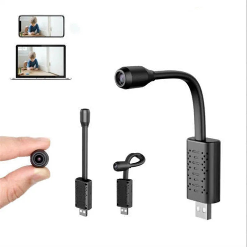 Black V380 wireless USB HD camera for computer security monitoring on a desk.