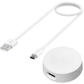 White PVC wireless charger base for Watch 6 and 5 Pro smartwatch charging dock.