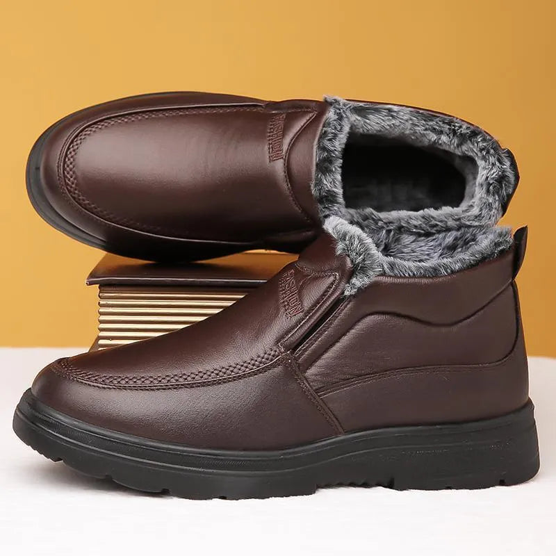Black and brown fleece-lined men's winter slip-on shoes with a waterproof PU upper and rubber sole.