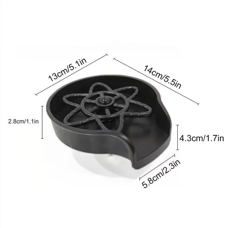 Black plastic household press type high pressure automatic cup washer on countertop