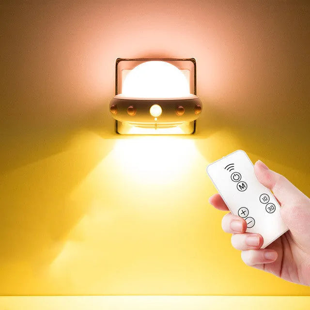 Remote control UFO shaped bedside night light in blue, pink, or white colour options