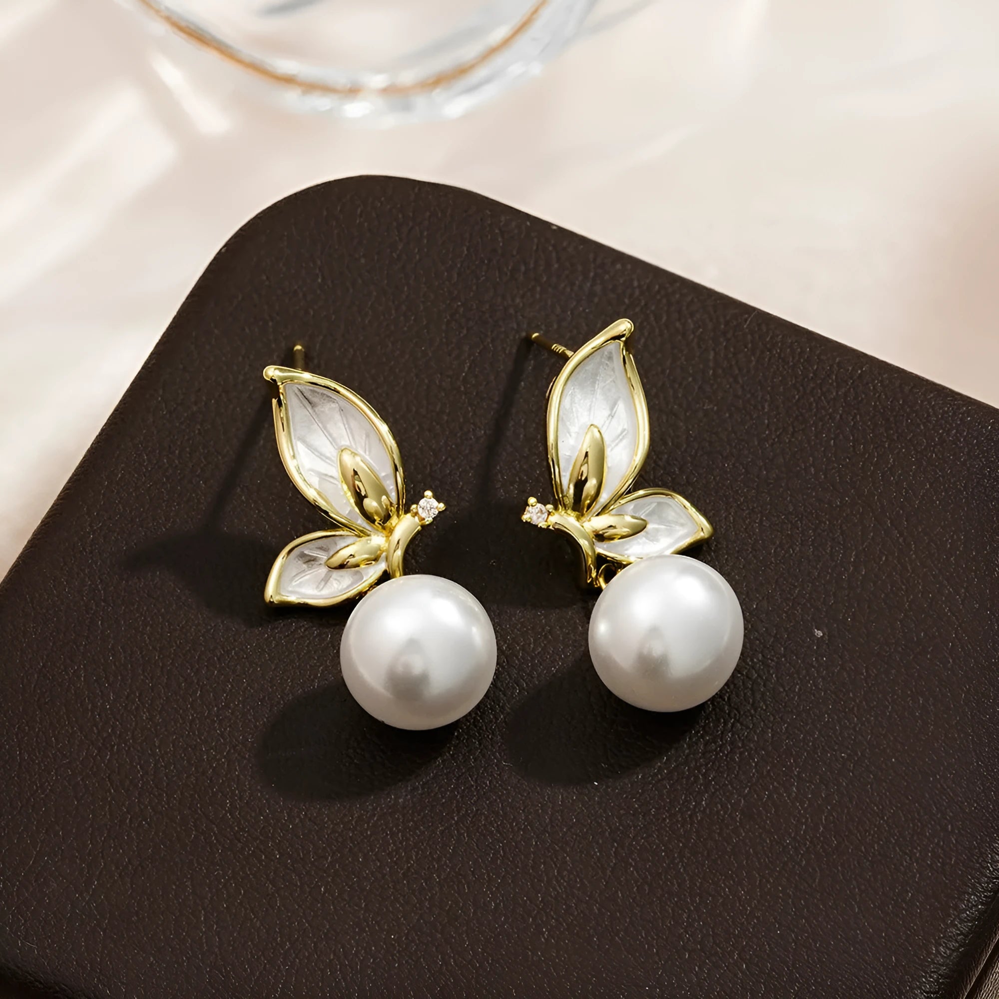 Copper butterfly earrings for women with electroplated finish and zircon painting details
