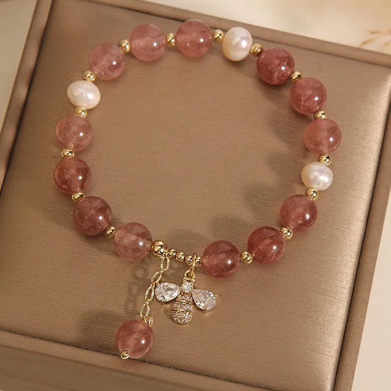 Freshwater pearl and strawberry quartz bracelet with zircon accents and bee charm