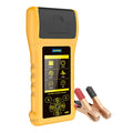 Autool BT760 vehicle battery tester with colour screen, thermal printer, and test clips on a workshop bench.