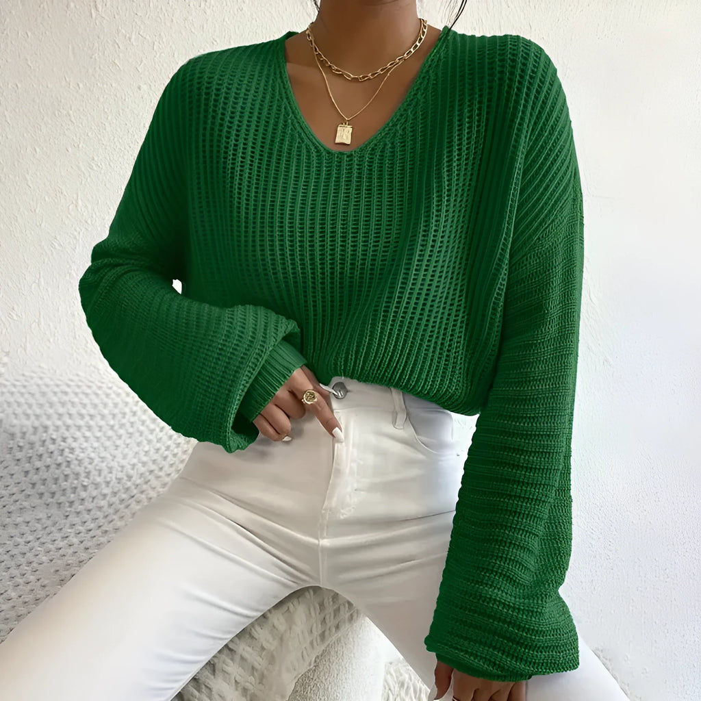Women's solid colour long sleeve polyester pullover casual top shown in available colours.