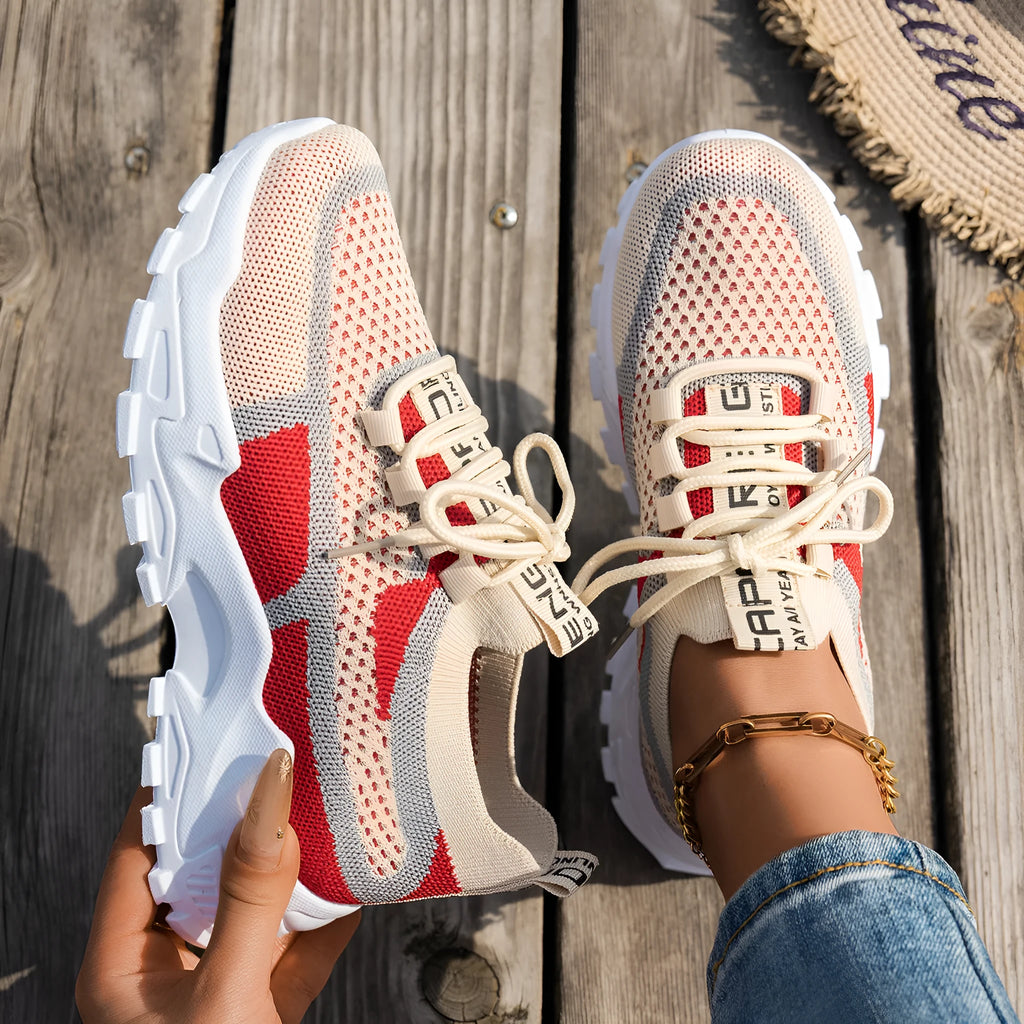 Women's Flyknit mesh lace-up sneakers in grey colour with low rubber sole
