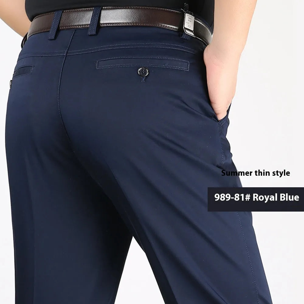 Men's casual elastic cotton high waisted loose trousers in creamy white, shown flat front view