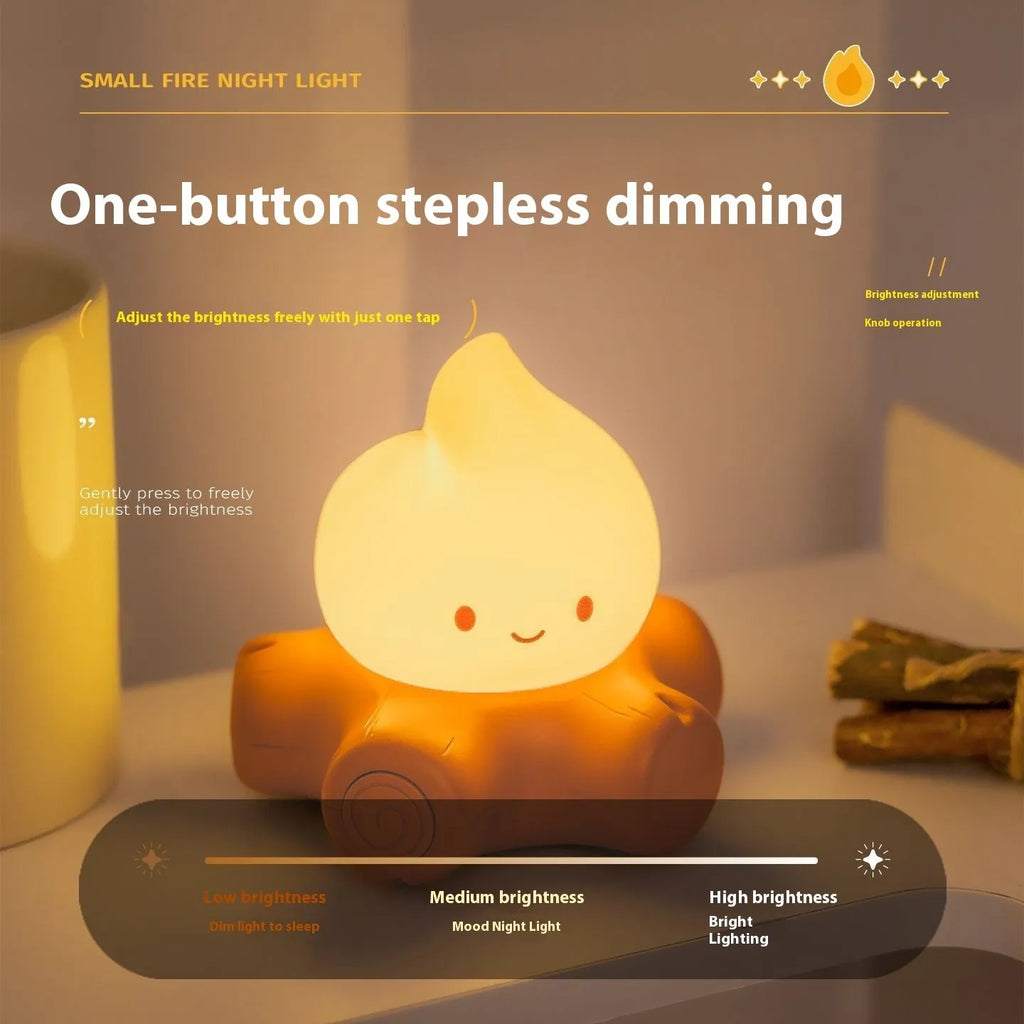 Cartoon silicone small fire pile night lamp showing yellow light illumination with ABS shade