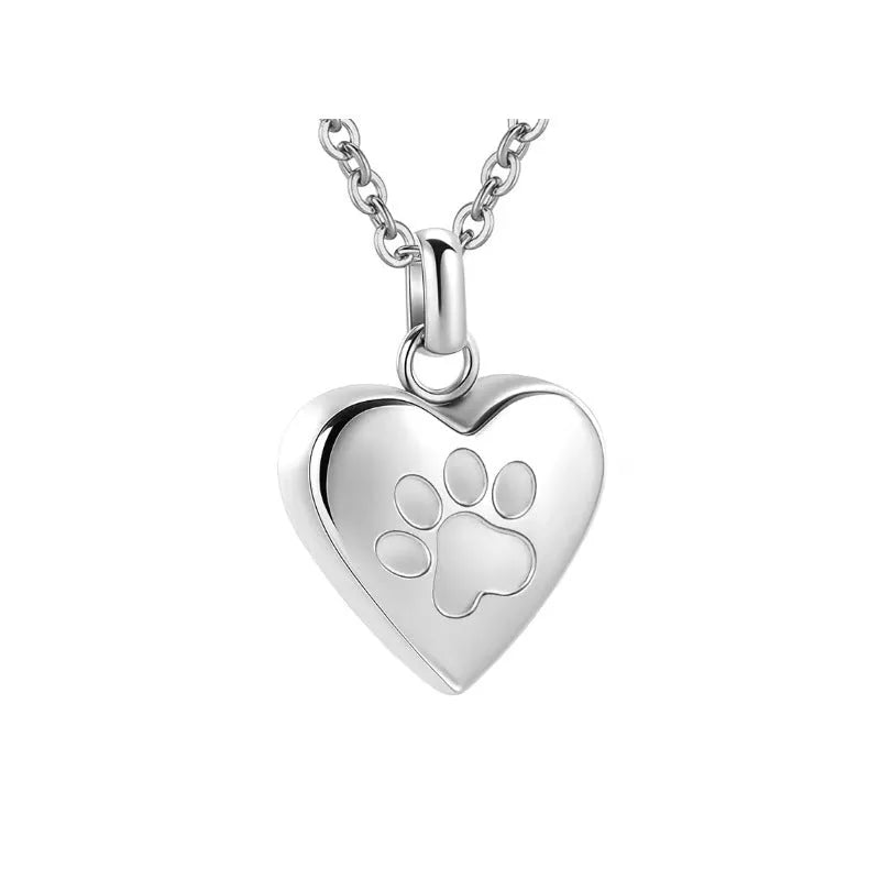 Openable heart-shaped titanium steel cinerary necklace on a chain, shown in multiple colour finishes.