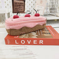 Cherry cake print velvet pencil case with a zip, shown closed.