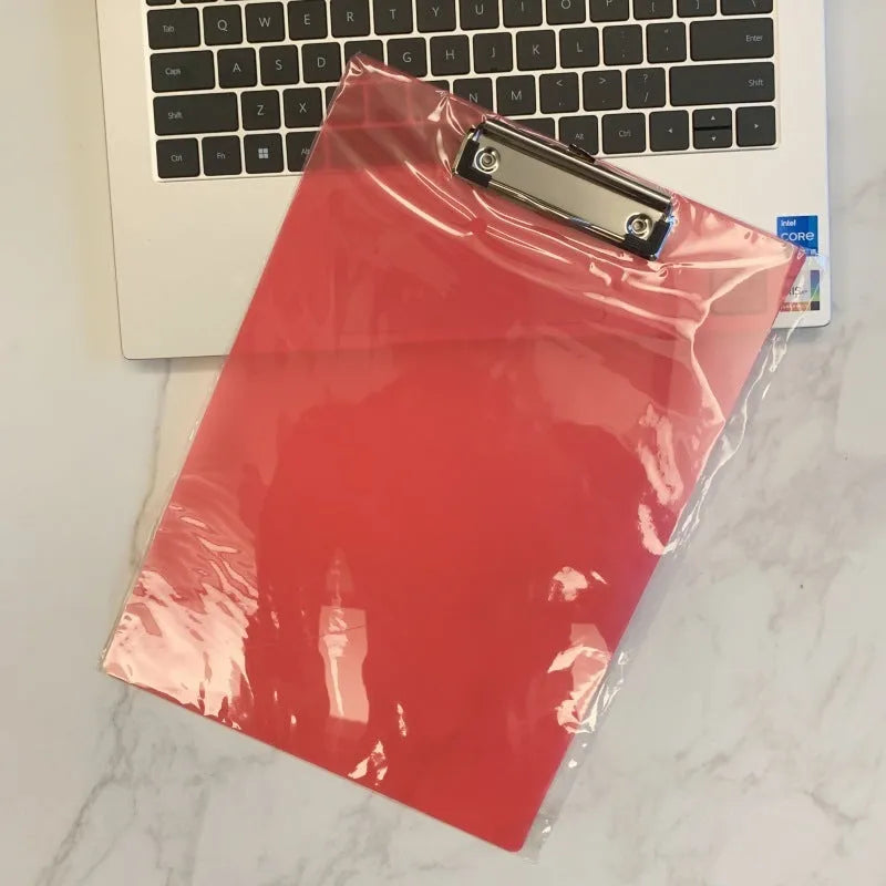 A4 transparent writing board pad with metal clip showing document display and writing surface