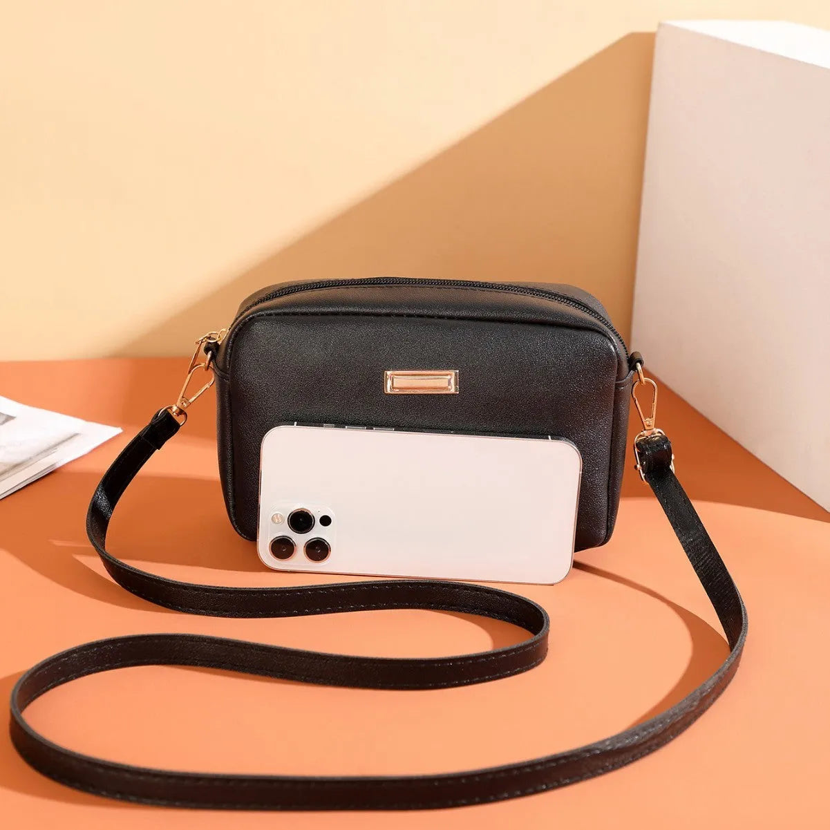 Women's solid colour PU leather shoulder bag with three-dimensional pocket in horizontal square shape