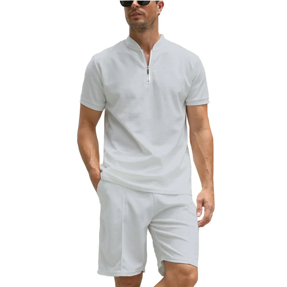Men's solid colour polo shirt and trouser two-piece casual suit set.