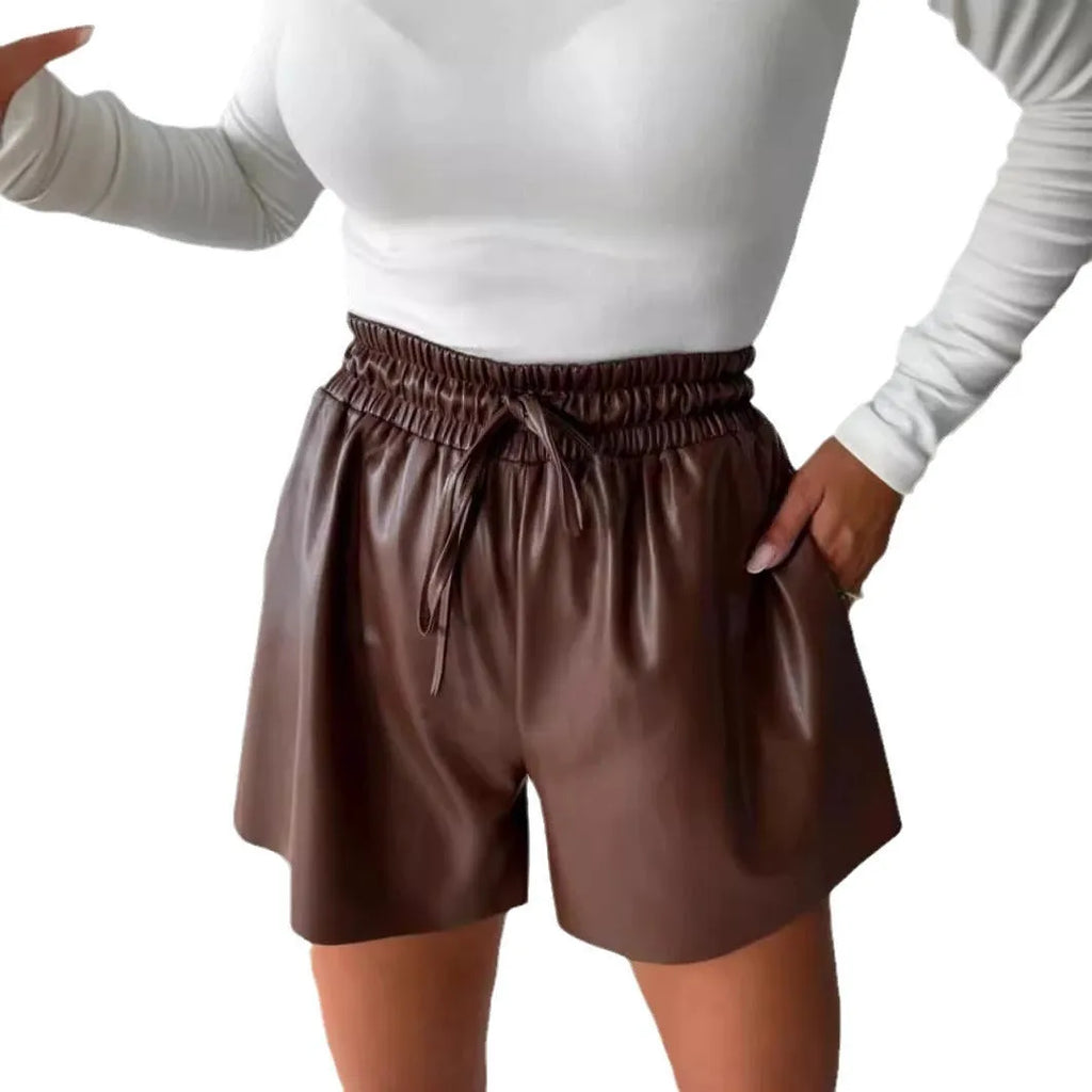 Women's black wide-leg casual shorts with lace-up waist detail and PU leather accents
