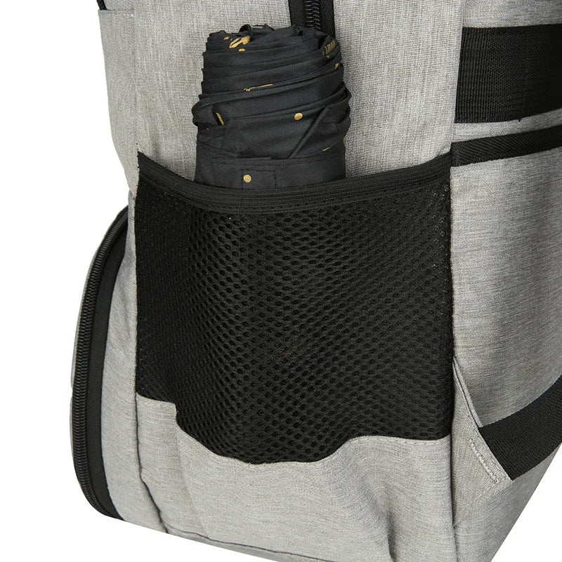 Insulated Oxford cloth picnic backpack in grey, showing main compartment and curved shoulder strap.