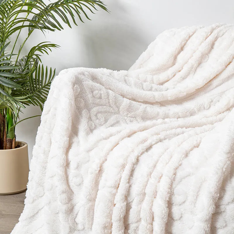 Cotton velvet jacquard sofa blanket showing plant flower pattern on solid colour background