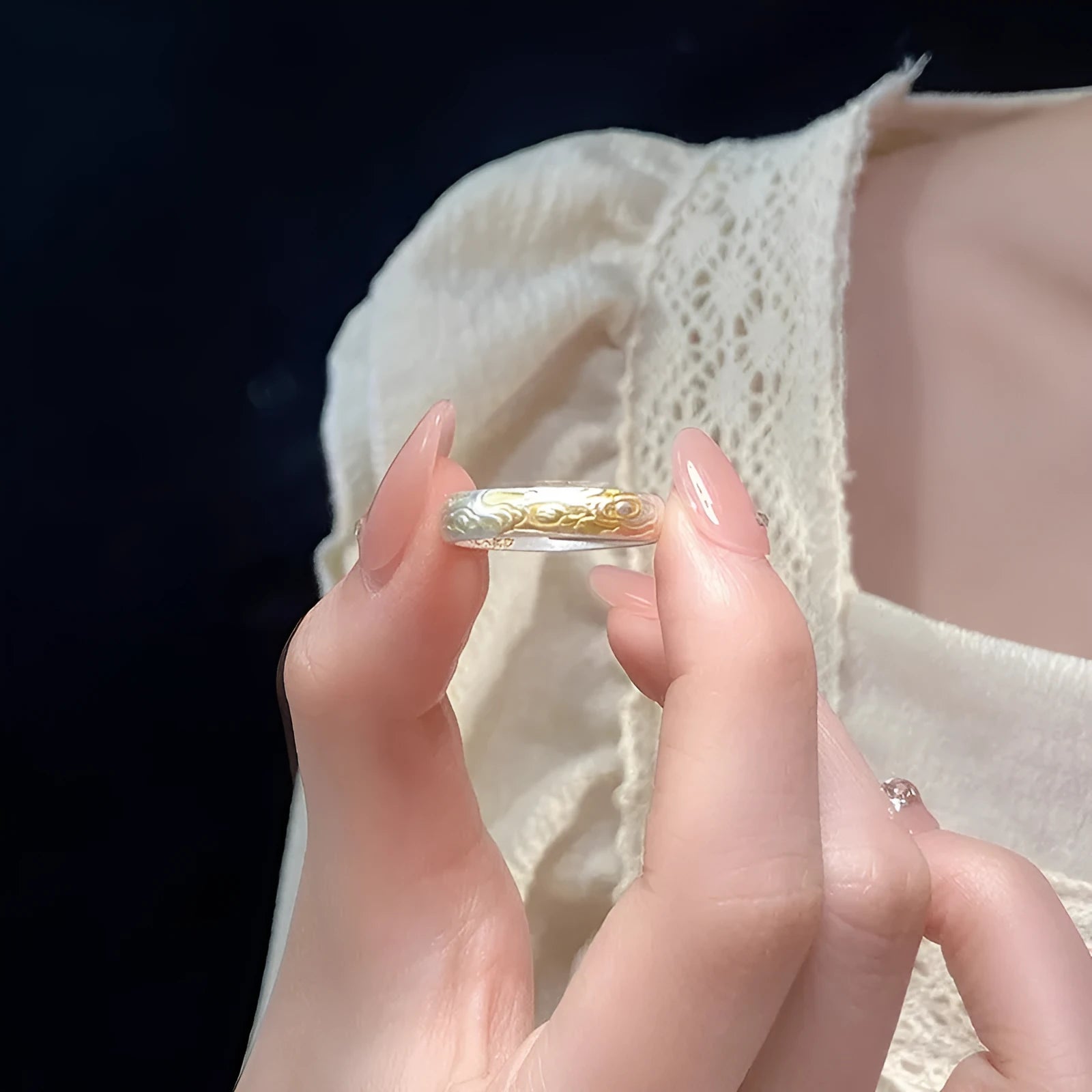 Open-mouth geometric white copper ring with Xiangyun pattern in silver-gold electroplate.