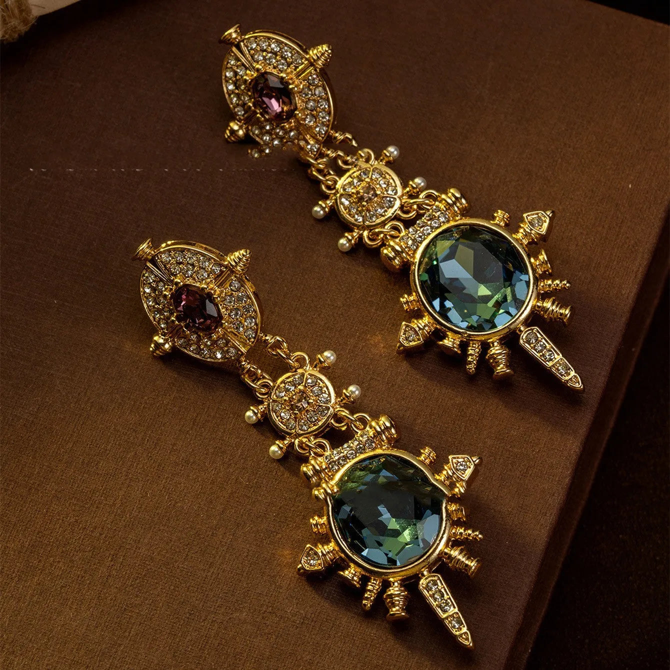 Gold geometric court style stud earrings with retro design and round elements