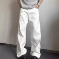 Men's loose straight leg white cotton denim jeans on a hanger.