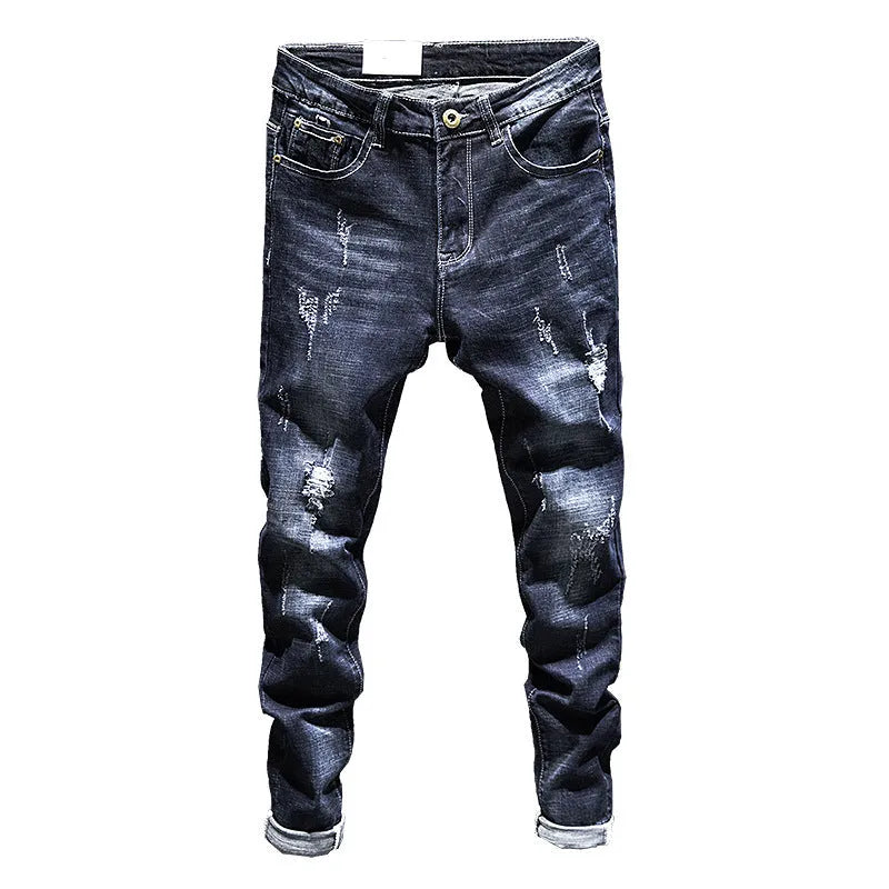 Men's slim-fit skinny jeans in dark blue denim on a neutral background.