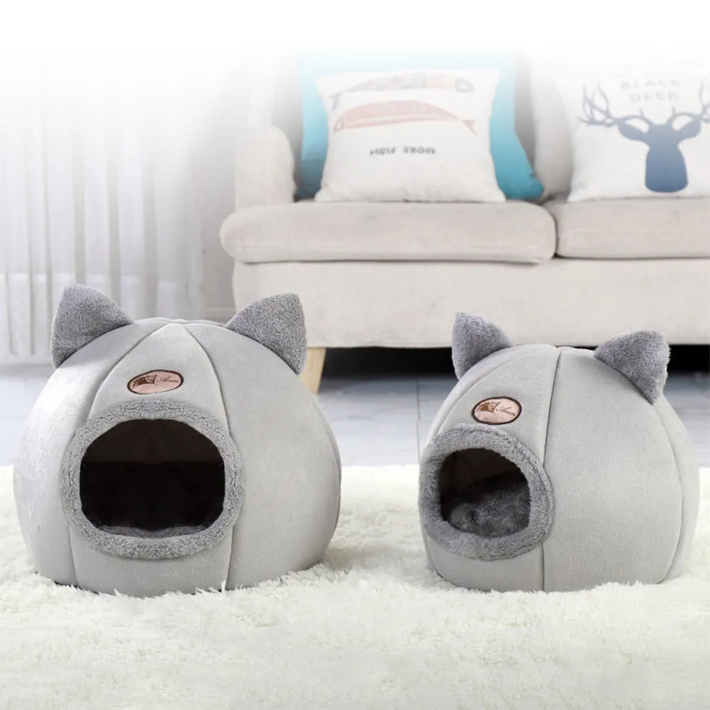 Large enclosed winter cat sofa bed with plush lining for indoor pet warmth