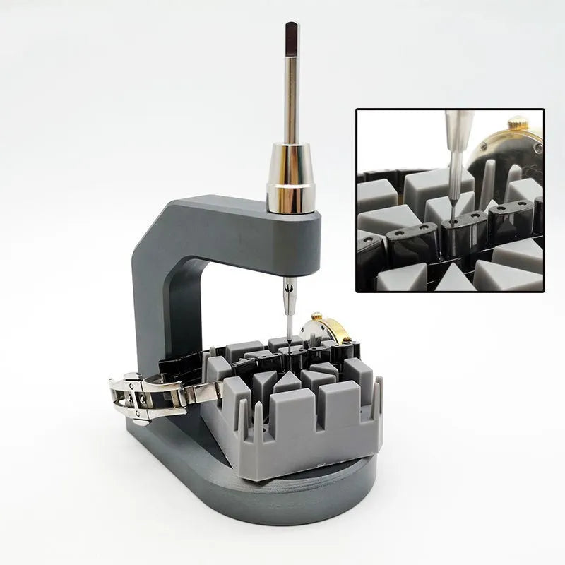 Silver-coloured press strap removal tool for watch and electronics repair.