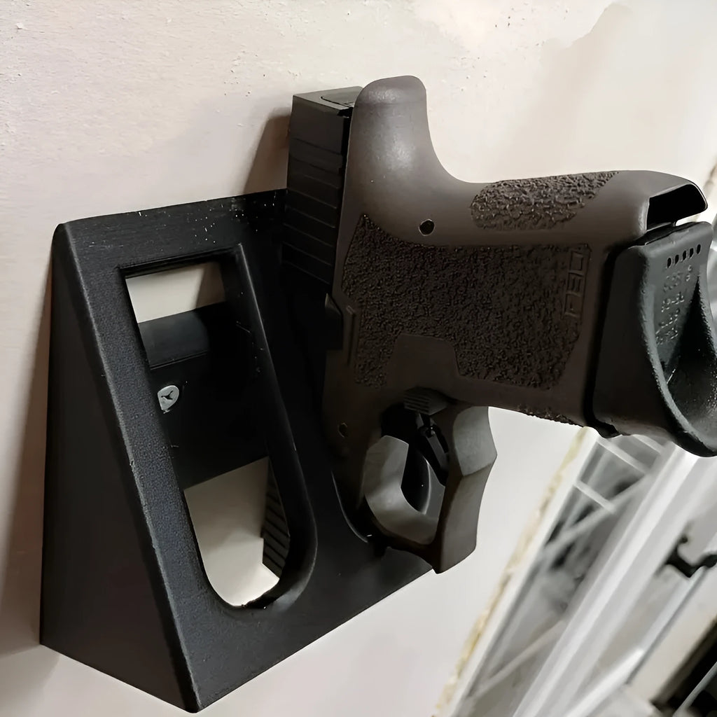 Black plastic punk-style pistol stand for replica firearm display
