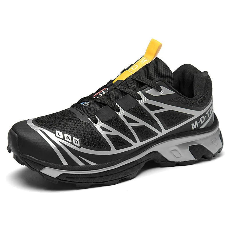 Low-top outdoor hiking shoes in artificial leather with mesh lining and rubber sole.