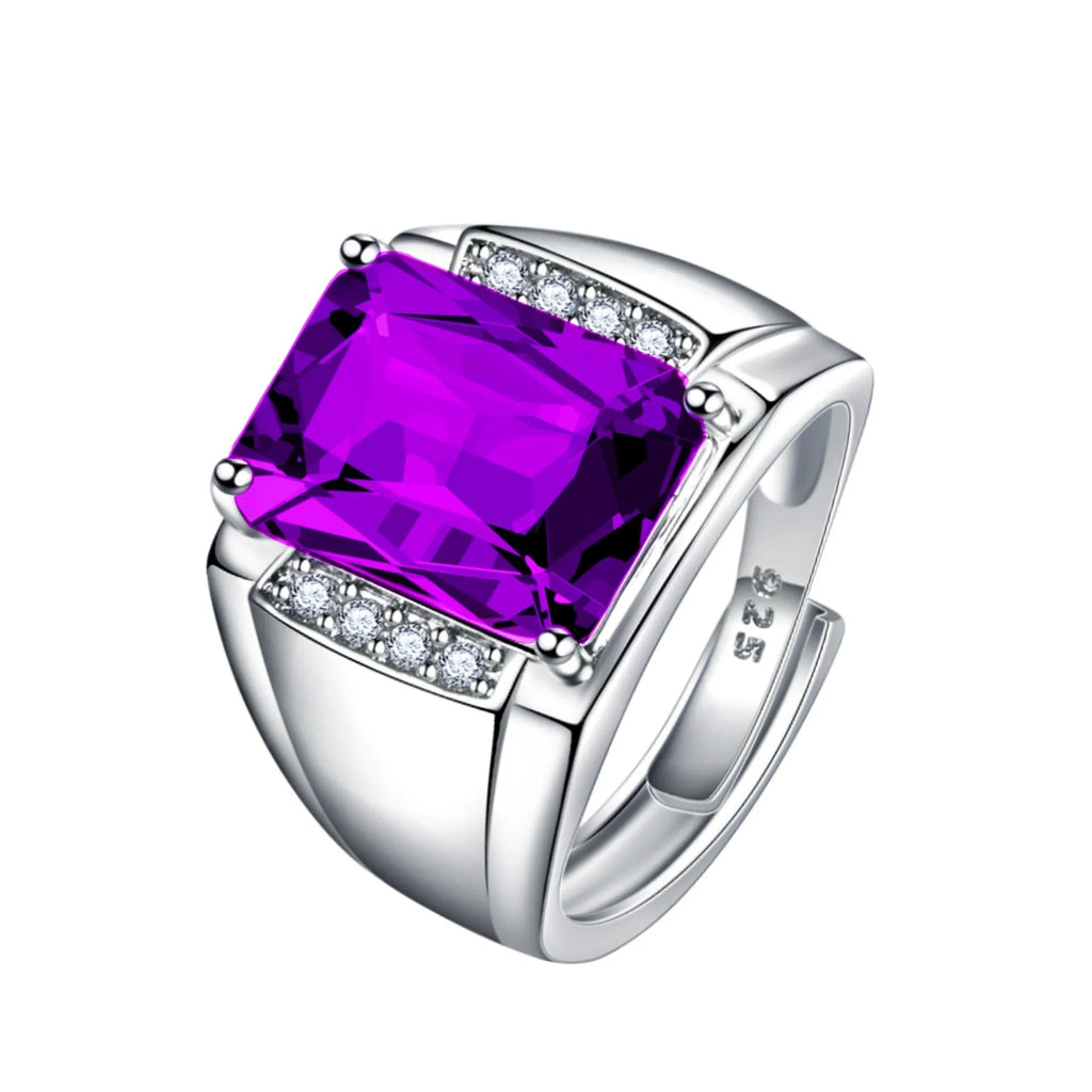 Adjustable copper ring with geometric band and a colourful rhinestone in a white gold coloured setting.