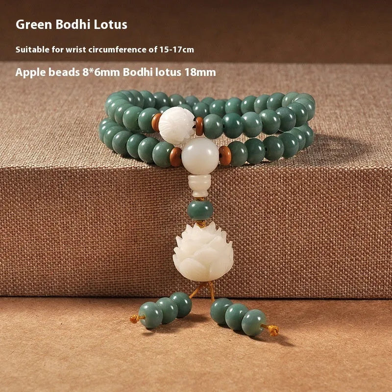 White jade bodhi seed bracelet with a double ring lotus safety buckle.