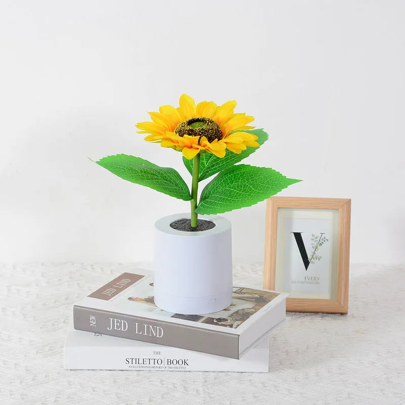 USB rechargeable artificial sunflower LED night light on table with decorative flower design