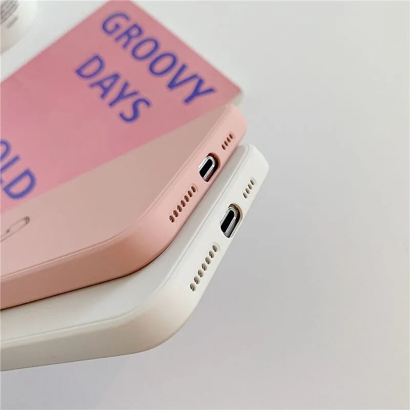 Silicone iPhone case in various solid colours showing precise port and button cutouts