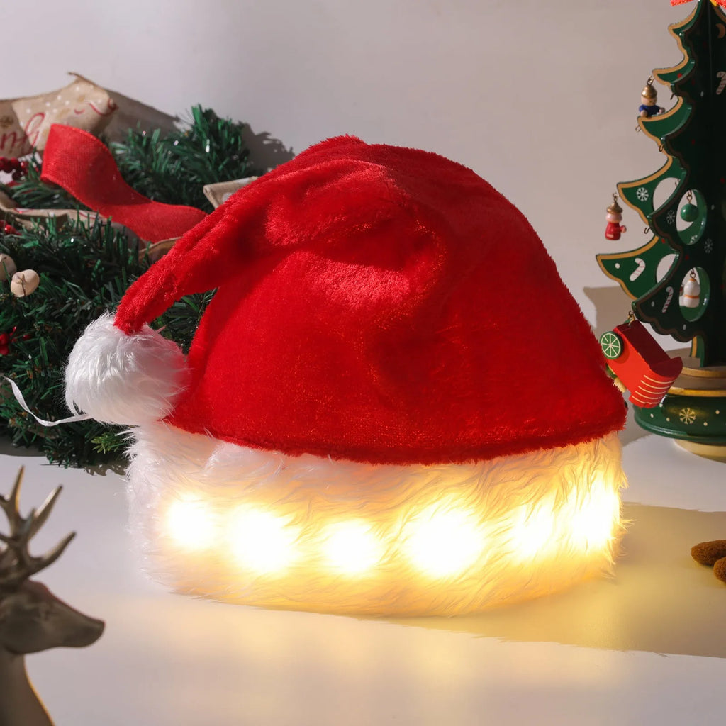 Red and white plush Santa hat with glowing LED lights around the brim and a white pom-pom.