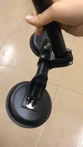 Black off-road car flagpole sucker base with round glass suction cup and rubber disc body.