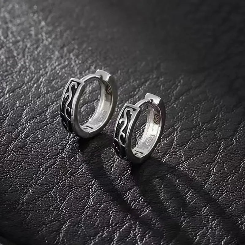 Men's geometric copper earring in silver, shown in single and pair configurations at 10mm and 14mm sizes.