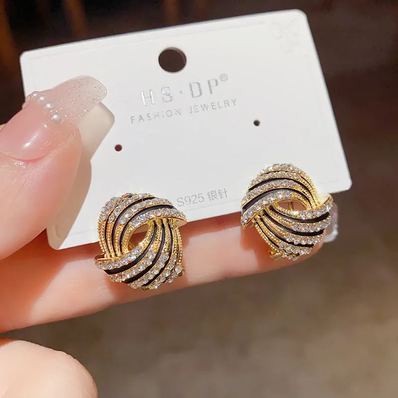 Pair of super flash rhinestone ear studs with thick real gold plating on copper base, geometric shape