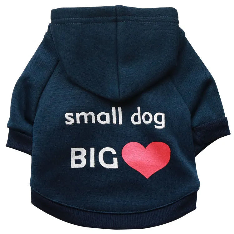 Fleece printed dog clothes in style A on a small dog, with collar opening and four leg holes
