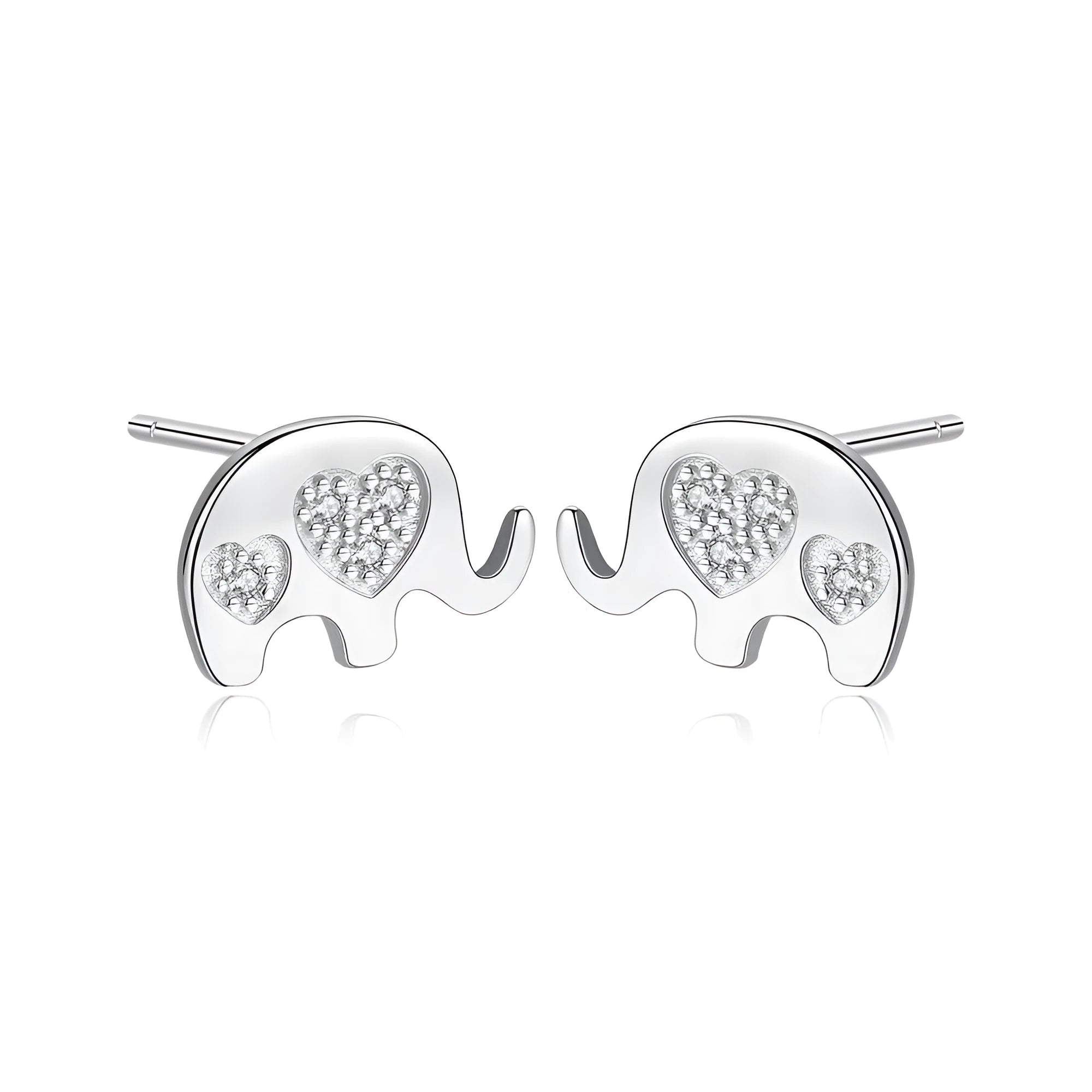 Small geometric silver stud earrings with gold or silvery finish on a grey background.