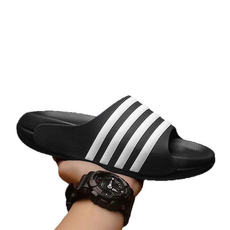 Casual unisex slippers with a PVC upper and EVA sole, shown in beige, black and white, blue and white, and green colour options.