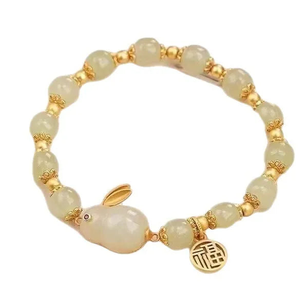 Green jade fu character lucky bracelet with hare charm on adjustable black cord