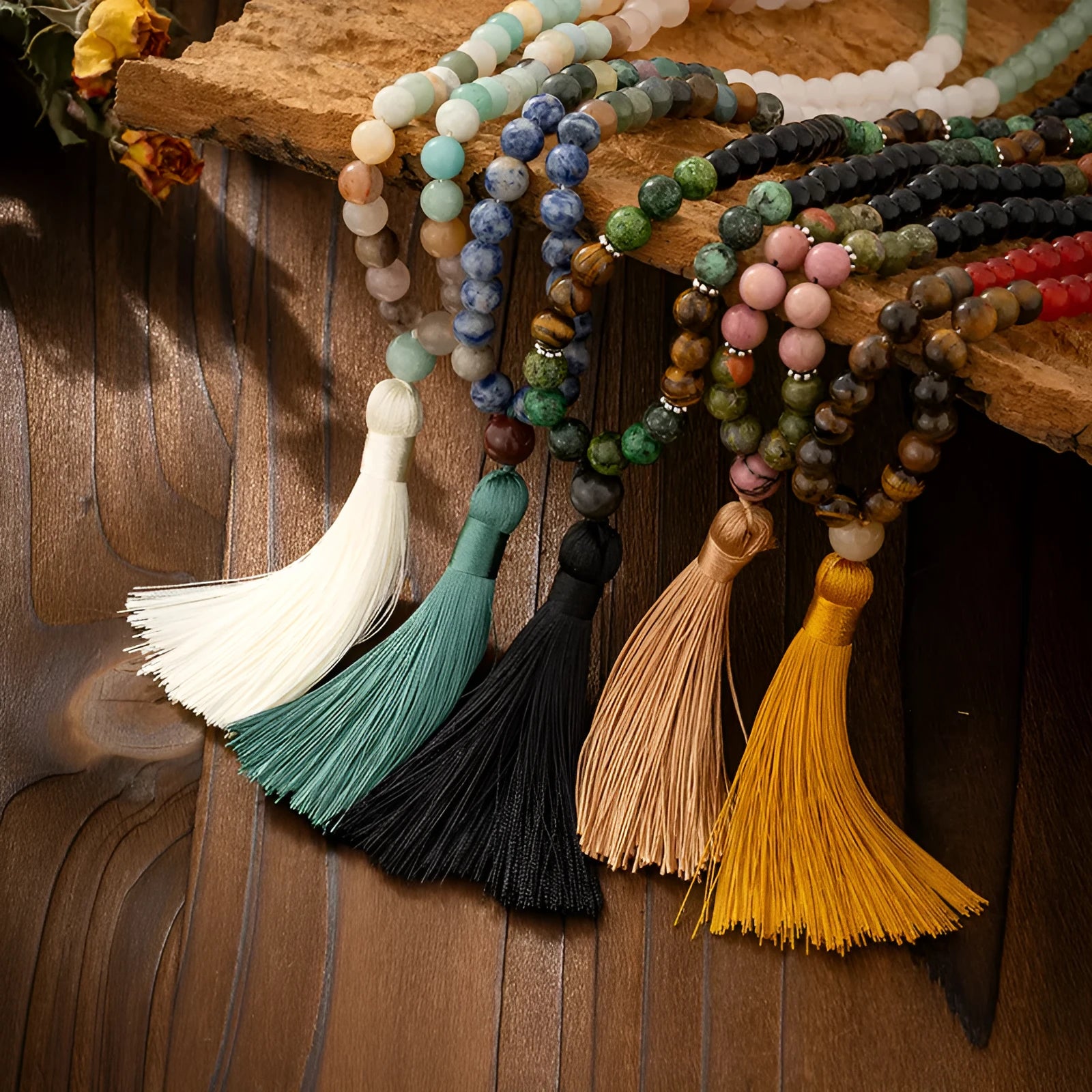 Bohemian style long necklace with natural stone beads and matching bracelet on a jumper
